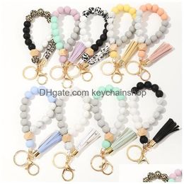 Key Rings Party Favour Keychain Wood Bead Sile Beads With Tassel String Chain Women Girl Ring Wrist Bracelet Drop Delivery Jewellery Dhjlt