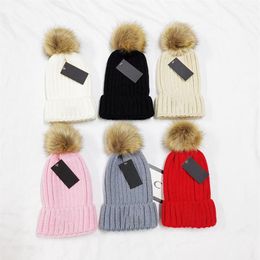 2021 High quality knit hat winter women thick style with real raccoon ball warm girl hats308t