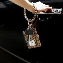 Keychains Spring And Autumn Woman Charm PU Leather Metal Car Keychain Work Bag Pendant Tassel Leopard Card Bracelet Key Ring