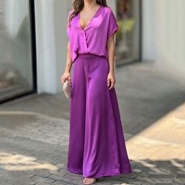 Women's Two Piece Pants Fuikio S-3XL Women's Casual Suit Purple Short-sleeved Low-cut V-neck Topwide-leg Trousers Fashion Sports Two-piece Set 230515