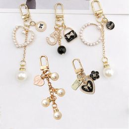 Exquisite Keychain Fashion Pearl Love Flower Keyring Geometric Key Chain Trendy Bag Pendant Charms For Women Gifts Accessories