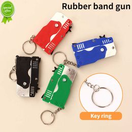 New Mini keychain Car Keychain Toy Gun Shooting Pistol Kid Outdoor Party Folding metal gun gift Car Styling Keyring Car Interior