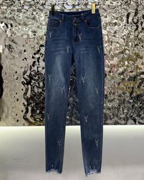 Jeans firmati da donna nuovi jeans jolly dritti a vita medio-alta gamba dei pantaloni moda lettera decorazione per il tempo libero