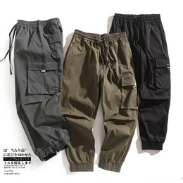 2023 fashion Spring summer and autumn Multi Pocket sportswear pants Street badge loose men's jogging suit outdoor function straight tube leisure style