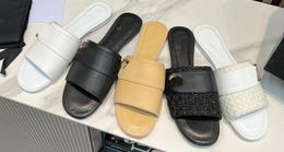 High Version Leather Flat Bottom One Word Cool Slippers Female Pearl Metal Buckle Small Incense Wind Leisure Beach Outside Wear Flip-flops