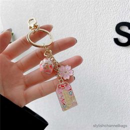 Keychains Omamori Sakura Amulet Lucky Cat Keychain Cute Pendant Clothes Backpack Keyring Key Chains Charms Friend Birthday Gift