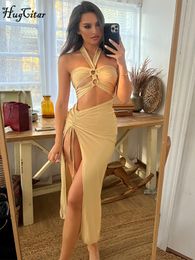 Basic Casual Dresses Hugcitar Satin Solid Halter Backless Draped Hollow Out Shirring Bandage Slim Maxi Prom Dress Sexy Summer Elegant Outfit Party 230518