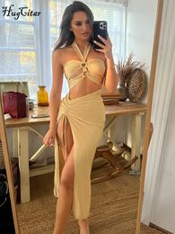 Basic Casual Dresses Hugcitar Satin Solid Halter Backless Draped Hollow Out Shirring Bandage Slim Maxi Prom Dress Sexy Summer Elegant Outfit Party 230519