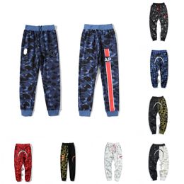 Pantaloni firmati da uomo Camo Red Pantaloni da jogging Harem da uomo Donna Streetwear Pantaloni mimetici casual Pantaloni della tuta Pantaloni con piede a fascio Taglia M-3XL