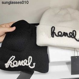 The correct version includes wool plush autumn and winter new small fragrance hat thickened pearl knitted wool hat and cold hat for warmth preservation
