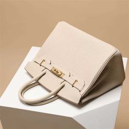 Togo Platinum Bag Tote 2024 Calf Leather Handmade Honey Line Genuine Leather Women's Litchi Pattern Lock Button Handbag