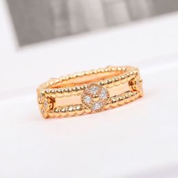 Ringe Kaleidoskop Ring weibliche Minderheit Design Sinn für einfache Van Rose -Splitter Glücksblume für Frauen Hochzeit Engagement