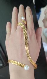 Bangle Fashion 18K Gold Colour Metal Net Cuff Palm Bangle Link Finger Ring One Piece Simulated Pearl Hand Palm Bangle Jewellery New Trendy