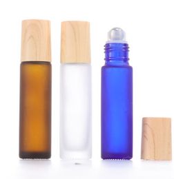 10ml Roll Perfume Bottle With Metal Roller Ball And Plastic Wood Grain Cover For Essential Oil Perfume Hot Selling Frosted Glass Roller Bottles