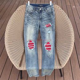 Дизайнерская одежда Amires Jeans Denim Pants Fashion Man Amies New 23ss Hole Red Patchwork Mx2 High Street Knife Cut Slim Skinny Jeans Man Distressed Ripped Skinny Moto