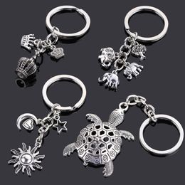 Keychain For Man Women Original Gift Friend Dragon Dog Cat Jewellery Love Heart Car Key Chain Gun Evil Eye Bag Pendant Wholesale