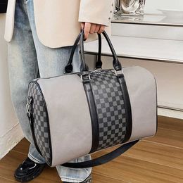 Soft layer PU anti splashing travel bag for men and women, portable large capacity fitness bag, versatile luggage storage 230526