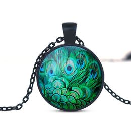 Pendant Necklaces New Fashion Crystal Necklace With Animal Pattern Charm Handmade Unique Art Peacock Wiggling Feather Wholesale Jewe Dhazm