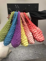 Spring and Summer New Bubble Flower Handheld Cylinder Bag Female Elastic Bubble Bag One Shoulder Handheld Bento Bag Shopping Bag Female 230527