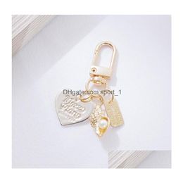 Keychains Lanyards Love Letter Shell Conch Pearl Keychain Girl Bag Hanging Charm Car Keyring Gift For Lover Trinket Drop Delivery Dhlqk