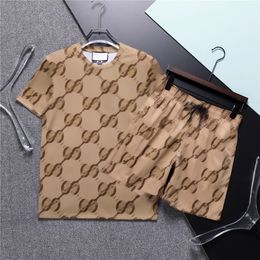 Luis Viton Shirt Designer T Shirt Mens Luxury Tracksuits Sets Sweatshirts Sports Suits Man Tracksuits Two Piece Set Vintage Shirt Summer Printed Short Sleeve 924
