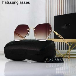 2022 Frameless large frame female sunglasses printed sunglasses Xiaoxiang new glasses two for one