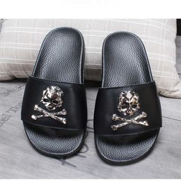 Arrival Women Leather Skull Slippers Men's Solid Flat Non slip Rubber Soles Metal Slides Unisex 0606