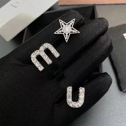 Star Miu Letter Diamond Tassel Asymmetriska örhängen S925 Silvernålörhängen