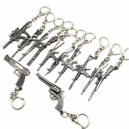 Whole 50pcs Lot Game Gun Model Key Chain Metal Alloy Key Rings Keys Holders Size 6cm Blister Card Package Key Chains256Z