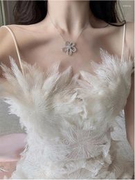 Casual Dresses Designer High Quality French White Feather Lace Floral Fairycore Dress 2023 Summer Hollow Out Sexy Slim Waist Suspender