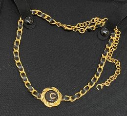 necklace with round shape in 18k gold plated black genuine leater have stamp