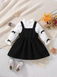 Clothing Sets 2piece Spring and Autumn Baby Girl Fashion Cute Comfortable Foreign Style Bow White Long Sleeve Black Suspenders Dress Set 231201