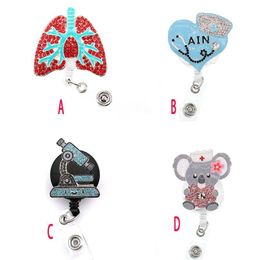 10pcs lot Key Rings Doctor Nurse Retractable Rhinestone Crystal Enamel Medical Pink Lung AIN Bear ID Badge Reel Holder Clip255Y