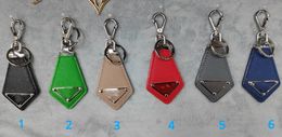 Classic Inverted Triangle Logo Metal Letter Keychain Personality Advanced Sense Pendant Decoration Bags