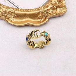 Top-Quality 18K Gold Plated Brand Letter Band Rings for Mens Womens Fashion Designer Brand Letters Turquoise Crystal Metal Daisy R244W