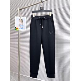 Pantaloni primaverili elastici Pantaloni sportivi da uomo e da donna firmati di lusso con piedi pizzicati piccola icona pantaloni in vita blu scuro3387696