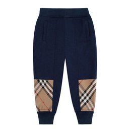 Children's pants autumn/winter new checkered color blocking casual sports pants for boys and children's warm and sanitary pants