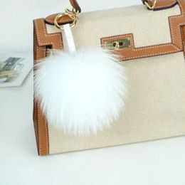 Keychains 15CM Fur Ball Pompom Keychain Natural Raccoon Keyring Pendant Bag Charm Creative Clothes Hats Accessories Gift