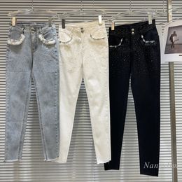 Women's Jeans Winter Skinny Jeans Women's White Jeans New Niche Socialite Fur Pockets Rhinestone Ultra Thin Fit Plus Velvet Warm Pencil Pants 231203