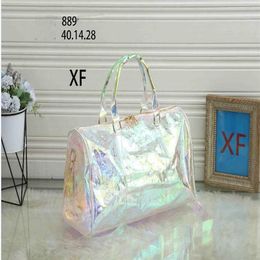 Designer women travel bags High Capacity luggage men shoulder pvc duffel bag carry on luggage Dazzle colour blue 40x14x28cm gyt273F