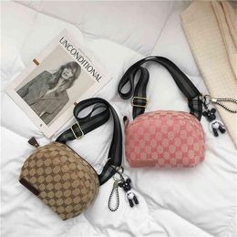 Net red small bag women's chest summer new canvas shell leisure wide shoulder belt messenger247I