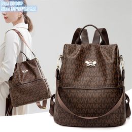 Whole factory ladies shoulder bag 2 Colours outdoor leisure leather backpack simple printed handbag sweet lovely metal decorati279b