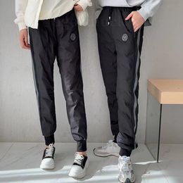 Pantaloni da uomo Designer d'oca giù per la vita medio imbottito caldo e anticonfesi uomini per le sue coppie invernali alla moda invernali casual.