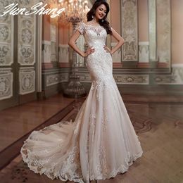 Urban Sexy Dresses YunShang Luxury Mermaid Wedding Dress Short Sleeves Lace Appliques Elegant Boat Neck Bride Gown Illusion Backless Button Train 231202