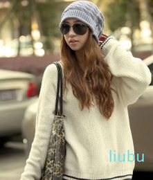 Winter warm oversized flexible cable knitting lazy fluffy bun wool hat tail female solid rib hat cold weather