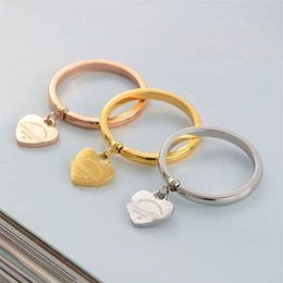 Factory Whole Love Letter Stainless Steel Hollow Tail Ring Pendant Ring gold silver rose for Couple Gift245M