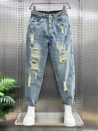 Ripped jeans male trend Korean version of loose washed small foot pants spring ball new elastic raw edge casual pants 27