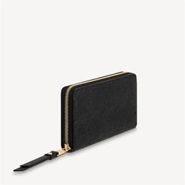 M61864 ZIPPY WALLET Empreinte Leather250r