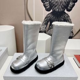 디자이너 Snow Apres-Ski Bootie 여성 슬립 온 chunky 겨울 따뜻한 모피 매듭 디자인 부티 특허 가죽 부츠 최고의 품질 두꺼운 신발