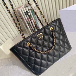 2023 designer bag High quality luxury women's Tote bag medium-sized fashion handbag Black and gold striped metal chain